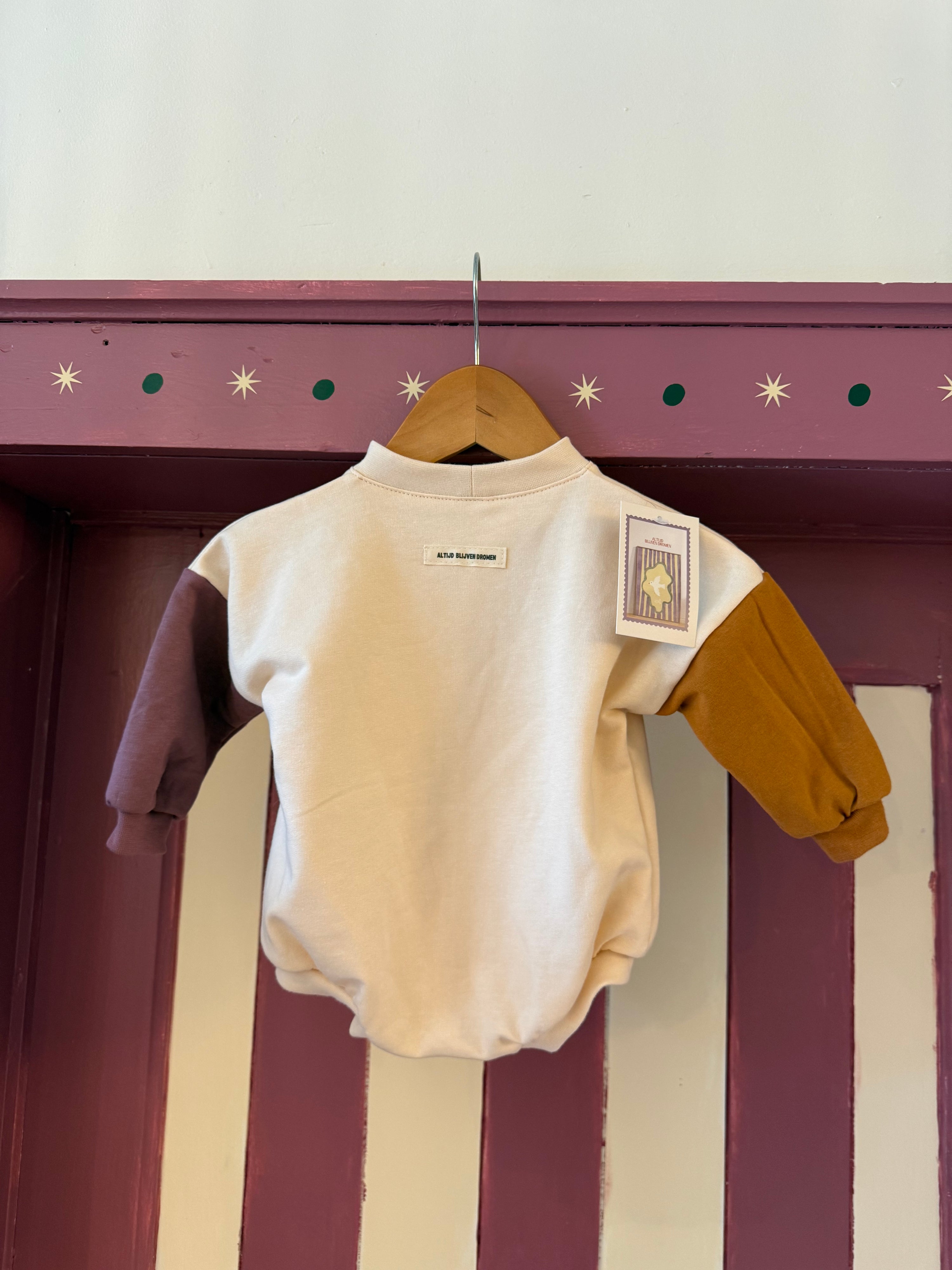 Sweaterromper - moon colorblock roze