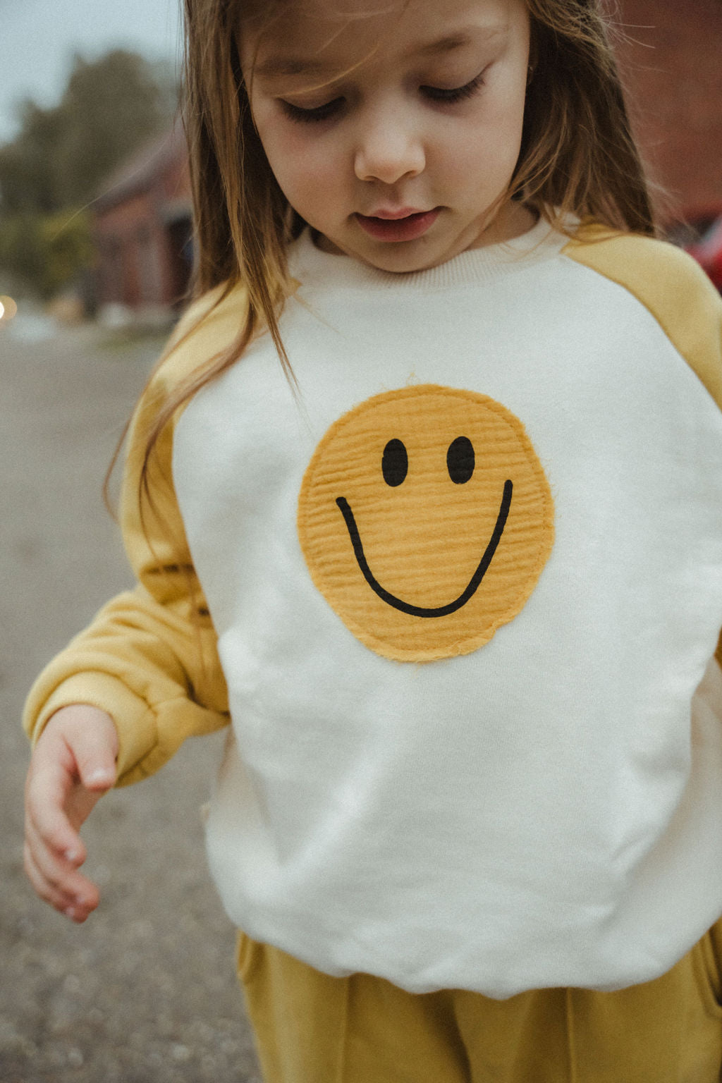 Jogging set big smiley oker